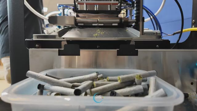 Moody Moon Cigarette Style Pre Roll Machine in Action